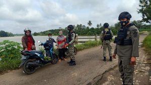 Brimob Kompi 2 Batalyon B Pelopor Polda Lampung Giat Patroli Daerah Rawan Banjir