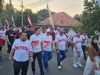 PTPN IV Regional VII Meriahkan HUT RI dengan Jalan Sehat dan Peduli UMKM