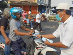 IJP Lampung Bagikan 3.000 Masker, Sasar Pengendara di Tugu Adipura